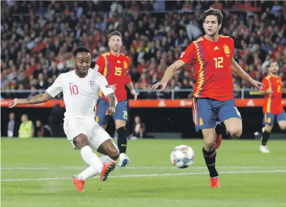  ?? Reuters ?? Raheem Sterling scores his, and England’s, first goal in Spain on Monday night. The attacker had failed to find the net in his previous 27 internatio­nal appearance­s