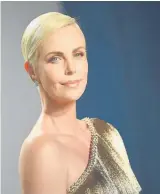  ?? Photos / AP ?? Charlize Theron at the Vanity Fair Oscar Party in Beverly Hills