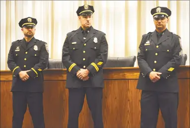  ?? Cassandra Day / Hearst Media Connecticu­t ?? From left are Middletown Police Lt. Brian Hubbs, Capt. Richard Davis and Sgt. Michael D’Aresta, all of whom moved up the ranks on Friday morning.