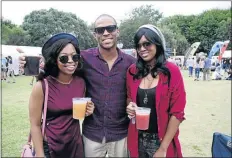  ??  ?? ALL FLAVOURS: Melisa Sithole, Thobani Khuzwayo and Ntombi Nondaba enjoy themselves at the fair