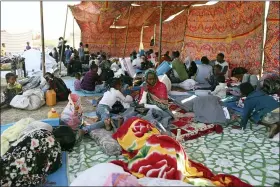  ?? MARWAN ALI — THE ASSOCIATED PRESS ?? Ethiopian refugees gather in Qadarif region Nov. 20, in eastern Sudan. Thousands of Ethiopians fled the war in Tigray region into Sudan.