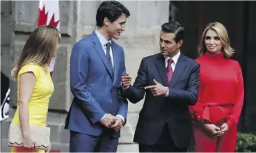  ?? REBECCA BLACKWELL / THE ASSOCIATED PRESS ?? Justin Trudeau and Sophie Grégoire Trudeau, left, visit with Mexican President Enrique Pena Nieto and wife Angelica Rivera in Mexico City on Thursday.