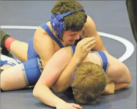  ?? / Scott Herpst ?? Ringgold’s Levi Lowery tries to put Trion’s Carter Conley on his back during the 150-pound bout of the NGAC Duals finals at Gordon Lee this past Saturday.