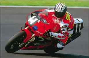  ??  ?? BELOW: Aaron winning one of his three back-to-back Suzuka 8-Hour races.