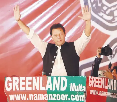  ?? ?? Pakistan’s former Prime Minister Imran Khan gestures as he addresses supporters of the Pakistan Justice Movement (PTI) during a rally in Multan, Pakistan, May 20, 2022.