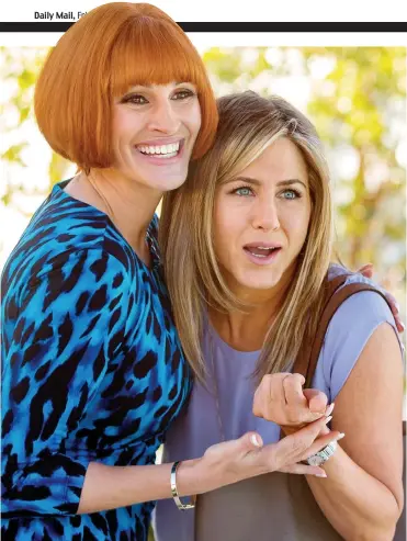  ??  ?? Mother’s ruin: Julia Roberts, in dodgy wig, and Jennifer Aniston in Mother’s Day
