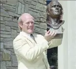  ?? Associated Press ?? Said Terry Bradshaw of his bronze bust as he stood on the steps of the Hall of Fame in August 1989 — “I’m so proud of that thing, ugly as that sucker is.”