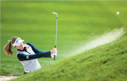  ?? CP PHOTO ?? Canadian Brooke Henderson blasts out of the sand on the eighth hole during a practice round ahead the CP Women’s Open in Aurora, Ont., on Tuesday.