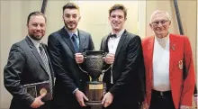  ?? ST. CATHARINES ROWING CLUB ?? Coach Scott Anderson, left, Andrew Allan, Mitch Rodgers and 1968 Olympic rower Clay Brown at St. Catharines Rowing Club's dinner.