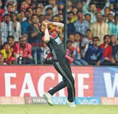  ?? Courtesy: IPL ?? Mohammad Siraj of Royal Challenger­s Bangalore takes a catch to dismiss dashing Punjab opener Chris Gayle.