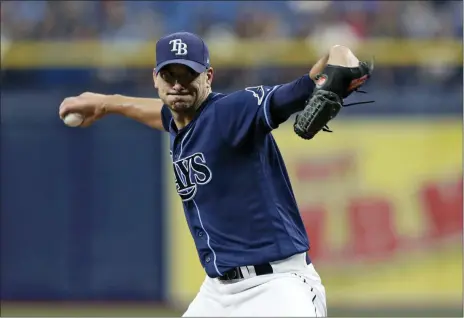  ?? CHRIS O’MEARA — THE ASSOCIATED PRESS ?? The Rays’ Charlie Morton goes into his delivery to the Red Sox during the first inning July 24 in St. Petersburg, Fla.