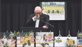  ?? Canadian Press photo ?? Pastor Sean Brandow speaks during a vigil Sunday at the Elgar Petersen Arena, home of the Humboldt Broncos, to honour the victims of a fatal bus accident in Humboldt, Sask.