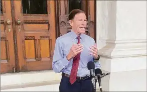  ?? Abigail Brone / Hearst Connecticu­t Media ?? U.S. Sen. Richard Blumenthal calls on the nation's major airlines to offer refunds on flights canceled by mismanagem­ent of staff during a news conference at the state Capitol in Hartford on Friday.