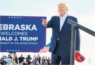 ?? SCOTT OLSON/GETTY ?? Former President Donald Trump arrives for a rally at the I-80 Speedway on Sunday in Greenwood, Neb.