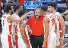 ?? AJ Mast The Associated Press ?? Houston coach Kelvin Sampson on Oregon State: “They’re a lot more like us in that they get on the boards … they play physical.”