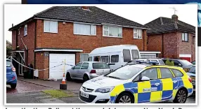  ??  ?? Investigat­ion: Police at the couple’s house on New Year’s Day