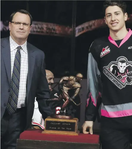  ?? GAVIN YOUNG/POSTMEDIA NETWORK ?? Hitmen general manager Mike Moore, left, believes this year’s WHL bantam draft is “deep” in terms of talent.