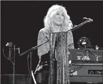  ?? Jeff Siner / Charlotte Observer ?? Christine Mcvie, keyboardis­t and vocalist for Fleetwood Mac, performs at the Spectrum Center in Charlotte, North Carolina, on Feb. 24, 2019. Mcvie died Wednesday at age 79.
