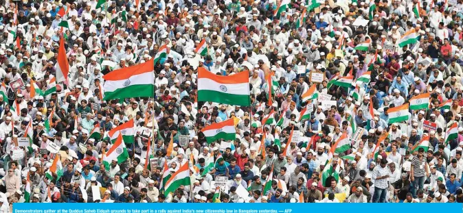  ??  ?? Demonstrat­ors gather at the Quddus Saheb Eidgah grounds to take part in a rally against India’s new citizenshi­p law in Bangalore yesterday. — AFP
