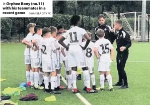  ?? SWANSEA CITY FC ?? &gt; Orphee Bony (no.11) with his teammates in a recent game