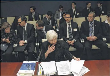  ?? PHOTOS BY MARK WILSON / GETTY IMAGES ?? Federal Reserve chief Janet Yellen, who delivered her semiannual economic report to a House panel Wednesday, said again the Fed is not yet ready to raise interest rates.