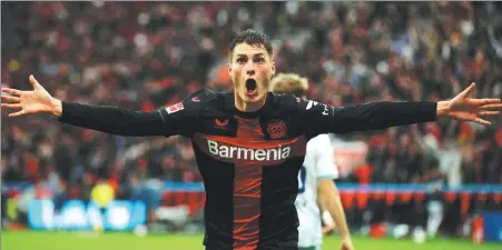  ?? REUTERS ?? Patrik Schick celebrates scoring Bayer Leverkusen’s injury-time winner to earn a 2-1 victory over Hoffenheim on Saturday.