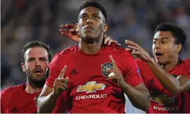  ??  ?? Anthony Martial celebrates the only goal from the penalty spot in Belgrade. Photograph: Srđan Suki/EPA