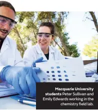  ??  ?? Macquarie University students Peter Sullivan and Emily Edwards working in the chemistry field lab.