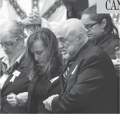  ?? CHRIS YOUNG / THE CANADIAN PRESS ?? Rocco and Carmela D’Amico follow the casket of their daughter Anne Marie following her funeral service in Toronto on Wednesday. D’Amico was one of the 10 victims of last Monday’s van attack on Yonge Street.