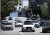  ?? KARL MONDON — STAFF PHOTOGRAPH­ER ?? A Cruise autonomous vehicle follows a Waymo autonomous vehicle in San Francisco in 2023.