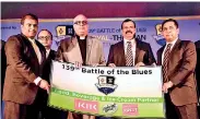 ??  ?? Presenting the sponsorshi­p. From left: John Keells Holdings Assistant Vice President and Keells Food Products PLC Sales and Distributi­on Head Shanil Perera, S. Thomas’ College Warden Rev Fr. Marc Billimoria, Royal College Principal B.A. Abeyratne and...
