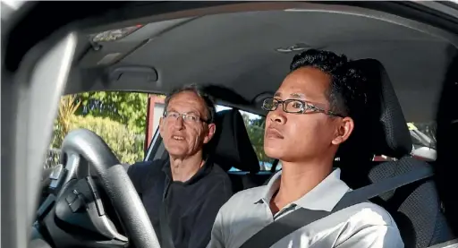  ?? PHOTO: MARION VAN DIJK/ FAIRFAX NZ ?? Red Cross Nelson Refugee Diver Training Programme mentor Nigel Dunlop, left, with learner driver Duh Tin Tlung.