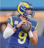  ?? Sean M. Haffey/Getty Images ?? QB Matthew Stafford and the Rams visit the Lions on Sunday in the NFC Wild Card.