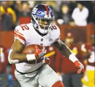  ?? Patrick Semansky / Associated Press ?? Giants rookie running back Wayne Gallman carried 12 times for 59 yards and caught seven passes for 40 yards last week against Dallas.