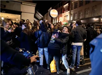  ?? Reuters ?? People party on street in London on Monday as the coronaviru­s restrictio­ns ease. —