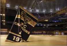  ?? AP PHOTO ?? In this Jan. 14, 2016, file photo, championsh­ip banners are removed from the Edward Jones Dome, former home of the St. Louis Rams football team in St. Louis.