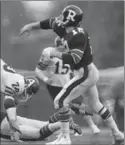  ??  ?? Rough Riders quarterbac­k Russ Jackson gets a pass away in Ottawa on Nov. 23, 1969.