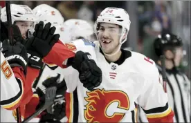  ?? AP file photo ?? Flames defenseman Travis Hamonic became the first NHL player to publicly opt out of the league’s return during the coronaviru­s pandemic. General manager Brad Treliving said Hamonic won’t play because of family reasons.