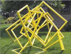  ?? Gilbert Boro / Contribute­d photo ?? A busy yellow sculpture against the green surroundin­gs at the Sculpture Grounds.
