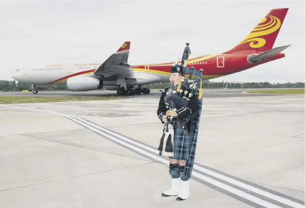  ?? PICTURE: IAN GEORGESON ?? 0 The launch of Hainan Airlines’s direct route between Beijing and Edinburgh was met with great fanfare – now it appears to be under threat