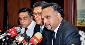  ??  ?? From right: Plantation Industries Minister Navin Dissanayak­e, Sri Lanka Tea Board Chairman Lucille Wijewarden­a and a Sri Lanka Tea Board officialPi­c by Kushan Pathiraja