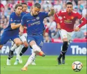  ?? REUTERS ?? Chelsea's Eden Hazard converts the firsthalf penalty.