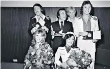  ??  ?? Hiller, back, second from left, with Brotherhoo­d of Man after winning the Eurovision Song Contest at The Hague in 1976