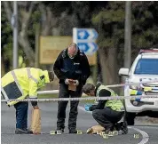  ?? WARWICK SMITH/STUFF ?? Police mark the scene of a suspected hit-andrun incident in Whanganui in which Fay Butler died.