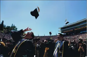  ?? RAY CHAVEZ STAFF ARCHIVES ?? Graduates throw their mortarboar­ds into the air at the conclusion of their UC Berkeley spring commenceme­nt ceremony at Memorial Stadium in Berkeley on May 12, 2018.