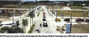  ?? ?? After only two years of site developmen­t the Davao Global township was officially inaugurate­d on July 23. the utilities and road networks of the former Davao Golf Club in Davao’s populous Matina district are now almost 100% completed prompting CLI through YHEST realty and Developmen­t Corp to offer 27 commercial lots for sale.