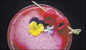  ??  ?? The Garden’s Eden cocktail contains Malfy Con Limone Gin, raspberry, lemon and egg white.