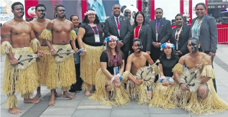  ?? Photo: Lusiana Tuimaisala ?? Fijian Ambassador to China, Manasa Tagicakiba­u (middle) on November 6, 2018 with the Fijian Government delegation and some of the students who are currently studying in China attending China’s Internatio­nal Import Expo (CIIE), in Shanghai.