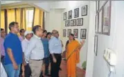  ?? SAI ?? ▪ Secretary sports, government of India, Rahul Bhatnagar (second from right) watching portraits of Arjuna awardees from UP and Uttarakhan­d after inaugurati­ng the ‘Hall of Fame’ in Lucknow on Monday.