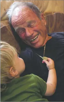  ?? SUBMITTED PHOTO ?? Granpa Jean Mayer with one of his many grandchild­ren, who were a big part of his life.